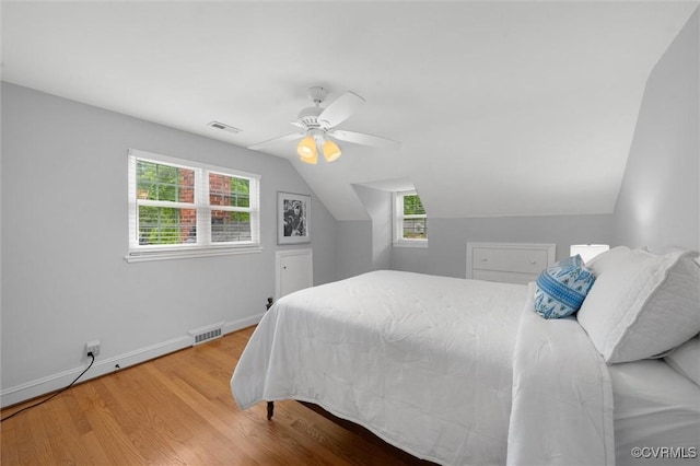 1004 Dinwiddie Ave, Henrico, VA 23229 - bedroom with wood finished floors, lofted ceiling, baseboards, and a ceiling fan