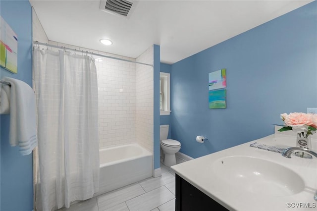 1004 Dinwiddie Ave, Henrico, VA 23229 - full bathroom with shower / tub combo, toilet, tile patterned floors, vanity, and baseboards