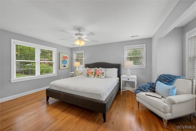 1004 Dinwiddie Ave, Henrico, VA 23229 - bedroom featuring wood finished floors, baseboards, and a ceiling fan