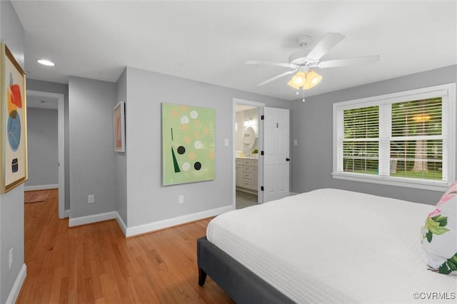 1004 Dinwiddie Ave, Henrico, VA 23229 - bedroom with baseboards, wood finished floors, recessed lighting, ceiling fan, and connected bathroom