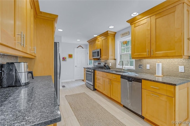 1222 Hull Harbor Rd, Heathsville, VA 22473 - kitchen featuring stainless steel appliances, tasteful backsplash, dark stone counters, and recessed lighting