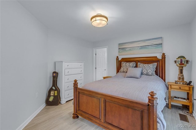 1222 Hull Harbor Rd, Heathsville, VA 22473 - bedroom with baseboards and light wood-style flooring