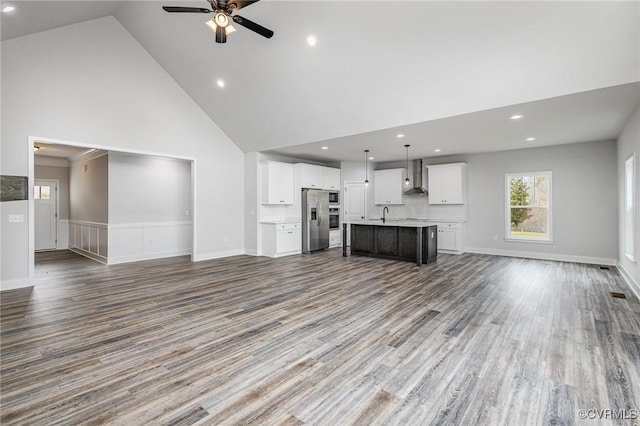 LOT10 Whartons Pass, Orange, VA 22567 - unfurnished living room featuring a ceiling fan, high vaulted ceiling, wood finished floors, recessed lighting, and a sink