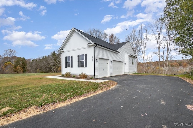 LOT10 Whartons Pass, Orange, VA 22567 - view of side of property featuring asphalt driveway, a lawn, and an attached garage