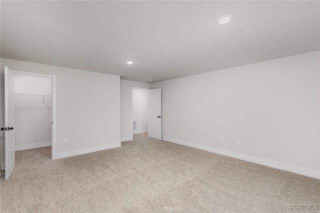 LOT10 Whartons Pass, Orange, VA 22567 - unfurnished bedroom with light carpet, recessed lighting, baseboards, a walk in closet, and a closet