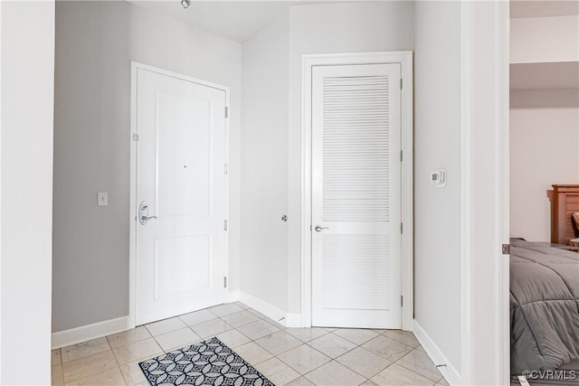 301 Virginia St Unit U806, Richmond, VA 23219 - foyer entrance with baseboards and light tile patterned floors