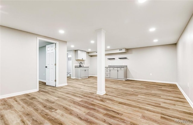 11517 Mount Hermon Rd, Ashland, VA 23005 - basement featuring light wood finished floors, recessed lighting, baseboards, and a sink
