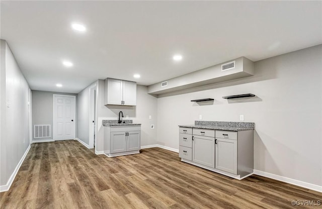 11517 Mount Hermon Rd, Ashland, VA 23005 - kitchen featuring wood finished floors, a sink, baseboards, recessed lighting, and open shelves