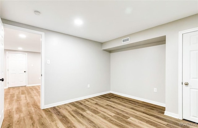 11517 Mount Hermon Rd, Ashland, VA 23005 - below grade area featuring light wood-style floors, baseboards, and recessed lighting