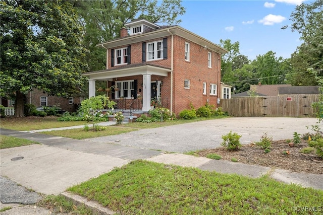 1942 Berkeley Ave, Petersburg, VA 23805 - traditional style home featuring covered porch and brick siding