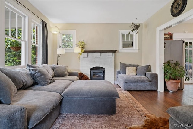 1942 Berkeley Ave, Petersburg, VA 23805 - living room with wood finished floors and a fireplace