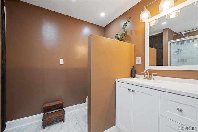 1942 Berkeley Ave, Petersburg, VA 23805 - bathroom featuring vanity, marble finish flooring, a shower, baseboards, and toilet