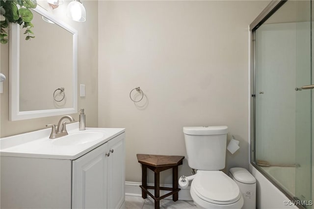 1942 Berkeley Ave, Petersburg, VA 23805 - bathroom with vanity, toilet, bath / shower combo with glass door, and baseboards