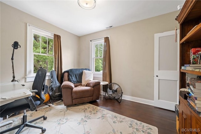 1942 Berkeley Ave, Petersburg, VA 23805 - home office with wood finished floors, healthy amount of natural light, and baseboards