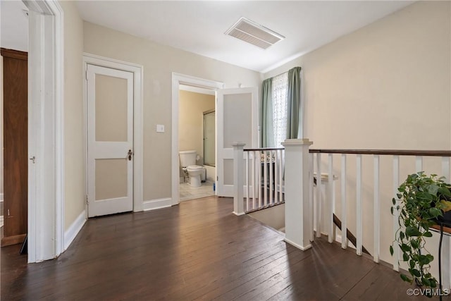 1942 Berkeley Ave, Petersburg, VA 23805 - hall with an upstairs landing, dark wood-style flooring, and baseboards