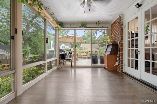 1942 Berkeley Ave, Petersburg, VA 23805 - unfurnished sunroom featuring ceiling fan, french doors, and wood finished floors