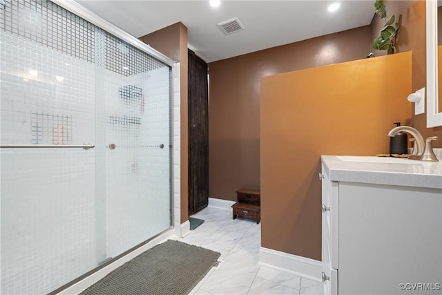 1942 Berkeley Ave, Petersburg, VA 23805 - bathroom with vanity, a stall shower, marble look tiles, recessed lighting, and baseboards