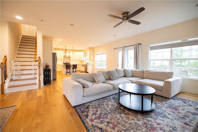 12194 Elnora Ln, Glen Allen, VA 23059 - living area with plenty of natural light, ceiling fan, light wood-style floors, stairs, and recessed lighting