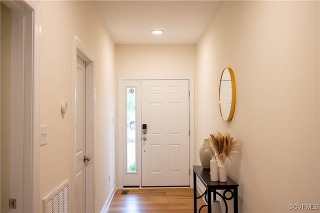 12194 Elnora Ln, Glen Allen, VA 23059 - entryway featuring wood finished floors, plenty of natural light, and recessed lighting