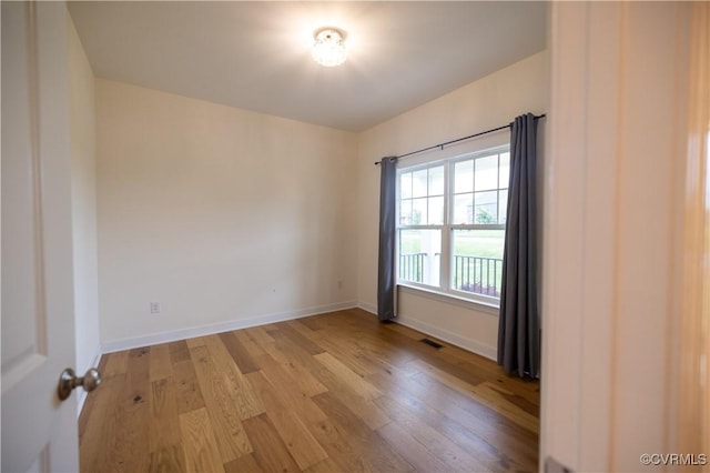 12194 Elnora Ln, Glen Allen, VA 23059 - unfurnished room featuring light wood finished floors and baseboards