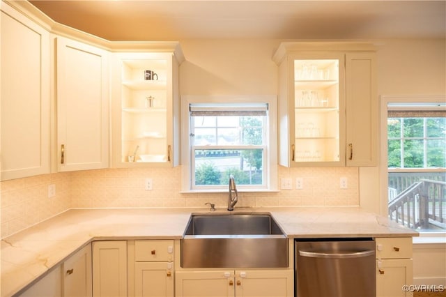 12194 Elnora Ln, Glen Allen, VA 23059 - kitchen featuring stainless steel dishwasher, a sink, glass insert cabinets, and backsplash