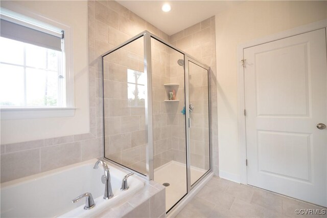 12194 Elnora Ln, Glen Allen, VA 23059 - bathroom featuring a garden tub, a stall shower, and recessed lighting