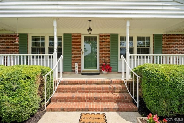 2861 Three Bridge Rd, Powhatan, VA 23139 - property entrance with a porch and brick siding