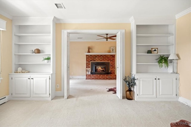 2861 Three Bridge Rd, Powhatan, VA 23139 - living room featuring light carpet, built in shelves, ornamental molding, a fireplace, and ceiling fan