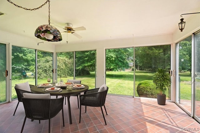2861 Three Bridge Rd, Powhatan, VA 23139 - sunroom with ceiling fan and outdoor dining space