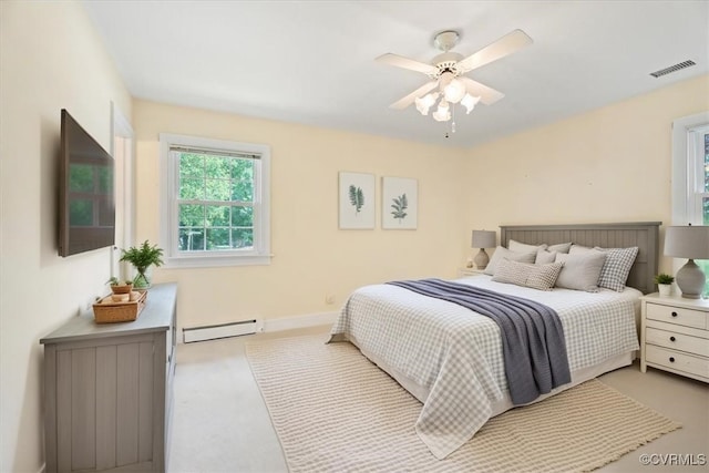 2861 Three Bridge Rd, Powhatan, VA 23139 - bedroom featuring a baseboard radiator, carpet flooring, and a ceiling fan