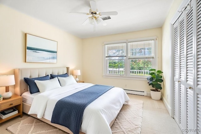2861 Three Bridge Rd, Powhatan, VA 23139 - bedroom with a baseboard heating unit, light carpet, and ceiling fan