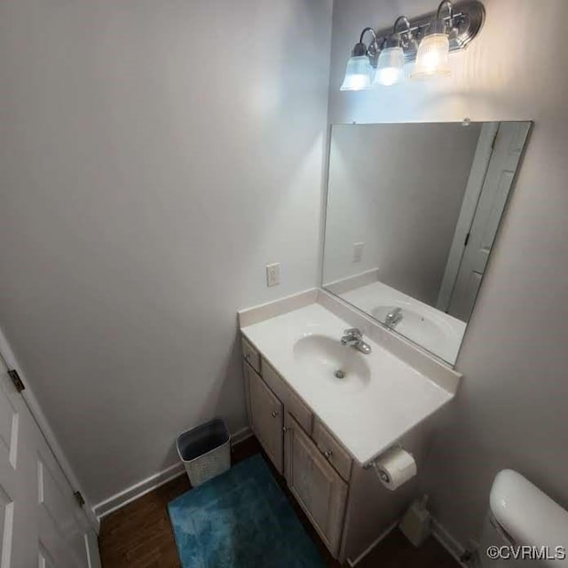 7408 First Landing Ct, Henrico, VA 23231 - bathroom featuring vanity and wood finished floors
