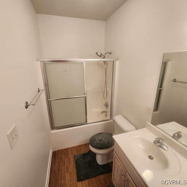 7408 First Landing Ct, Henrico, VA 23231 - full bath with wood finished floors, vanity, and shower / bath combination with glass door