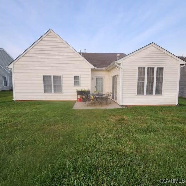 7408 First Landing Ct, Henrico, VA 23231 - rear view of house with a lawn and a patio area