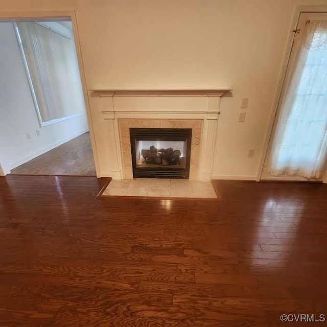 7408 First Landing Ct, Henrico, VA 23231 - detailed view of wood finished floors and a fireplace