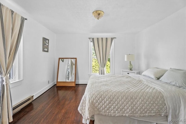 24405 N James Madison Hwy, New Canton, VA 23123 - bedroom featuring a baseboard radiator, dark wood-style floors, and baseboards