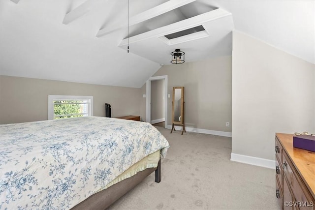 24405 N James Madison Hwy, New Canton, VA 23123 - bedroom with vaulted ceiling, light carpet, and baseboards