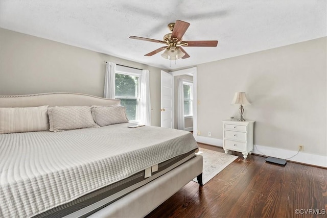 24405 N James Madison Hwy, New Canton, VA 23123 - bedroom featuring dark wood-style flooring, baseboards, and ceiling fan
