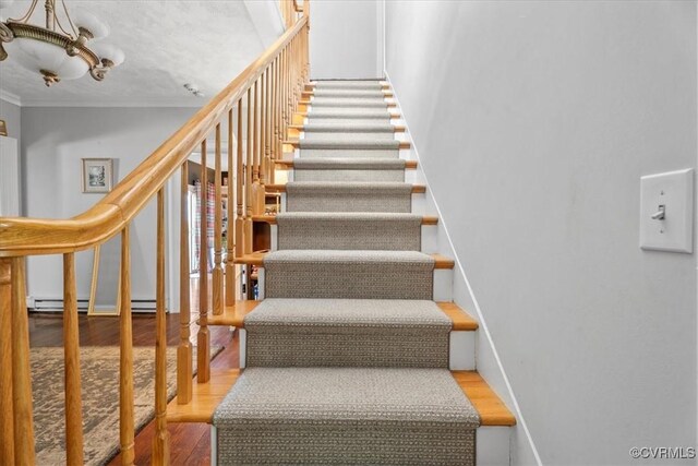 24405 N James Madison Hwy, New Canton, VA 23123 - stairs featuring wood finished floors, ornamental molding, and a chandelier