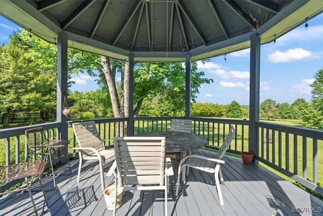 24405 N James Madison Hwy, New Canton, VA 23123 - wooden terrace with outdoor dining area, a gazebo, and view of scattered trees