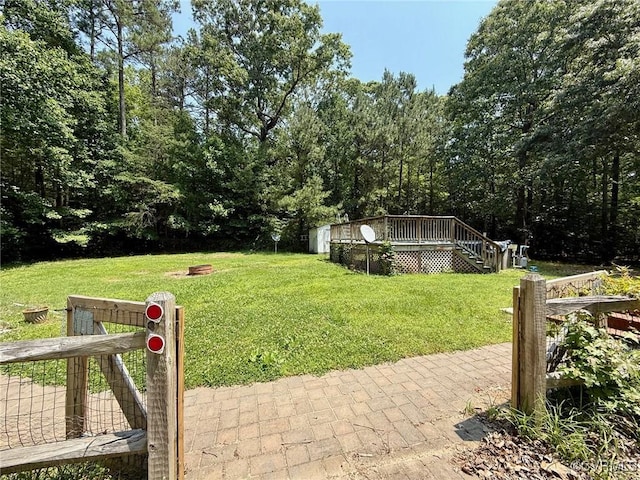 241 Levelfield Ln, Lancaster, VA 22503 - view of green lawn featuring a deck