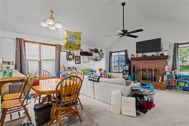 106 S Marion Ave Unit A, Hopewell, VA 23860 - carpeted dining space with lofted ceiling, a brick fireplace, and a ceiling fan