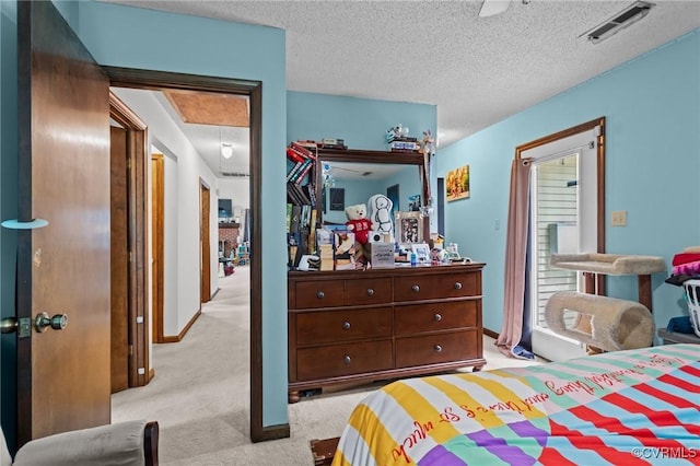 106 S Marion Ave Unit A, Hopewell, VA 23860 - carpeted bedroom featuring a textured ceiling