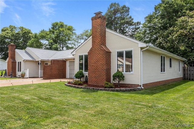 106 S Marion Ave Unit A, Hopewell, VA 23860 - view of front of home featuring an attached garage and a chimney