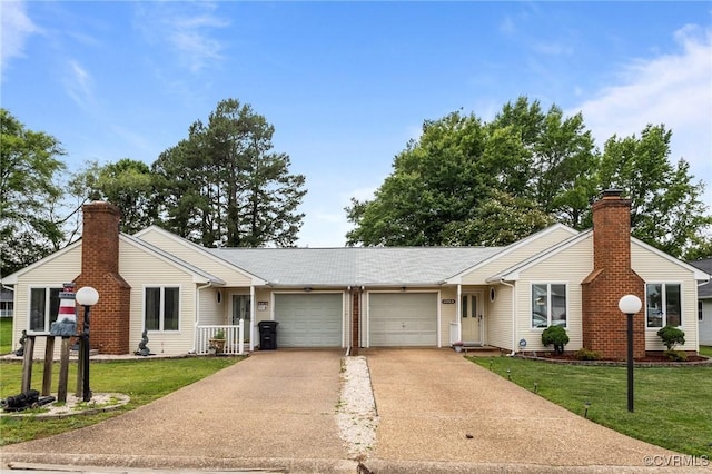 106 S Marion Ave Unit A, Hopewell, VA 23860 - ranch-style house featuring a garage, a chimney, a front yard, and concrete driveway