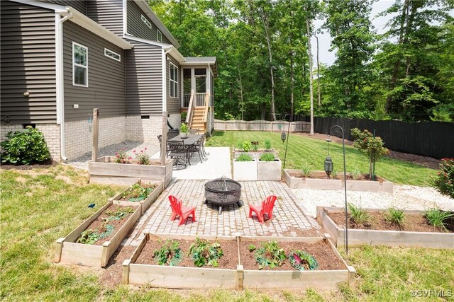 2401 Willowvale Pl, Midlothian, VA 23112 - view of patio featuring a vegetable garden and a fire pit
