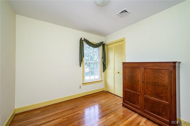 10108 Waltham Dr, Henrico, VA 23238 - unfurnished bedroom featuring light wood-type flooring and a closet