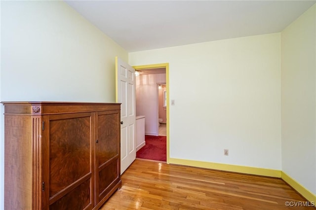 10108 Waltham Dr, Henrico, VA 23238 - unfurnished bedroom with light wood-style flooring and baseboards