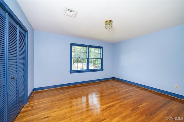 10108 Waltham Dr, Henrico, VA 23238 - unfurnished bedroom with a closet and light wood-style floors