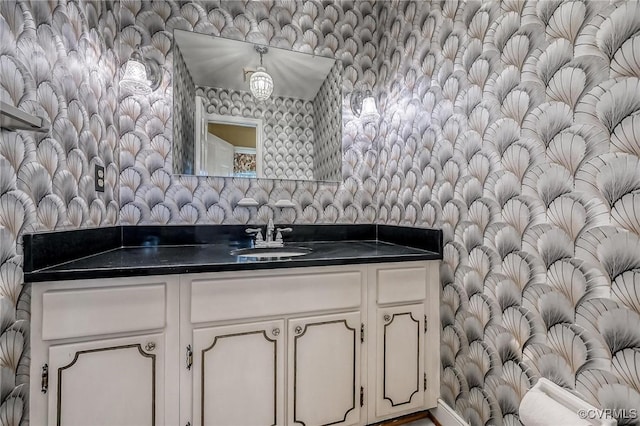 10108 Waltham Dr, Henrico, VA 23238 - bathroom featuring wallpapered walls and vanity